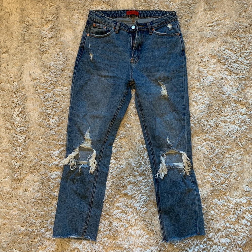 Ripped knee jeans